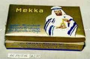 Pappschachtel für 50 Gramm Tabak "Mekka milder Feinschnitt Orient-Mischung für Zigarette u. Pfeife" (Abbildung eines Arabers mit Tabakdose)