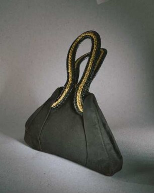 Handtasche mit geflochtenen Henkeln aus Bast in Schwarz und Gold (Archivtitel)
