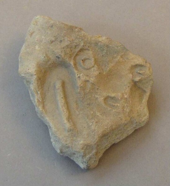 Tampon d'argile (fragment)