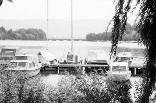 Lindau: Vom Inseldamm zur Seebrücke, Hintergrund Gittertor Anglerverein