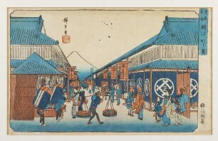 Strassenszene in Edo (Tokyo) mit dem Berg Fujiyama im Hintergrund