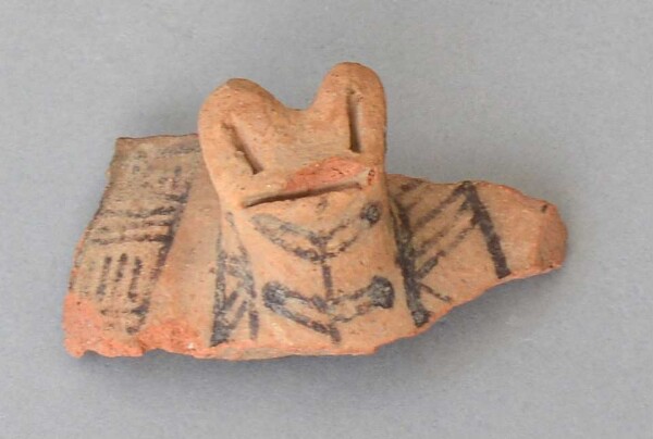 Fragment of a clay vessel