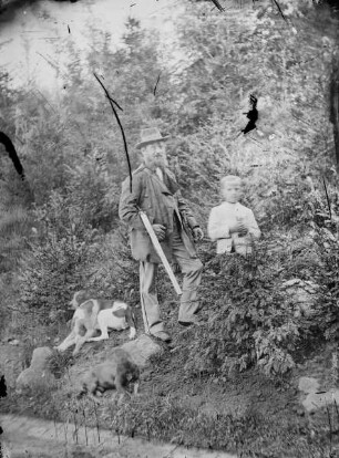 Jäger mit Jungem und Hund
