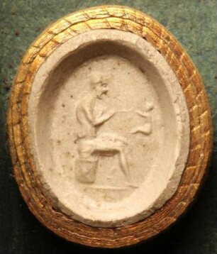Vulcan (Hephaistos), sitzend, verfertigt das Bildnis eines Kindes (Daktyliothek, Supplement)