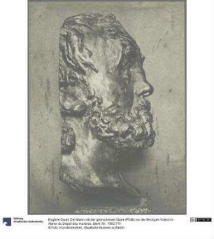 Der Mann mit der gebrochenen Nase (Profil) vor der fleckigen Wand im Atelier du Dépot des marbres