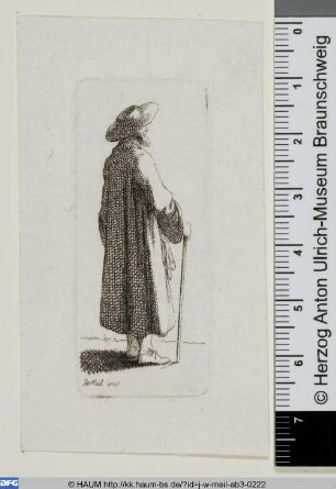 Rückenansicht eines Mannes bekleidet mit Mantel, Hut und Gehstock