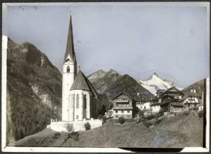 Österreich. Blick auf Heiligenblut mit Großglockner mit Pfarrkirche