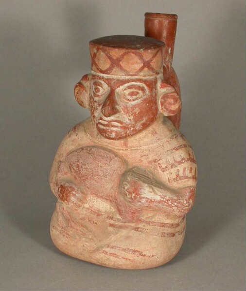 Seated anthropomorphic figure with an animal on his arm