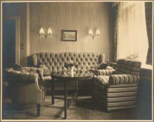 Wohnung. Inneneinrichtung: Wohnraum Sitzgruppe mit Sessel und Sofa