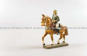Massefigur: Kavallerie-Offizier mit gezogenem Degen / auf Pferd
