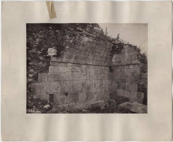 "Sculptured room wall of a building at the ball court."