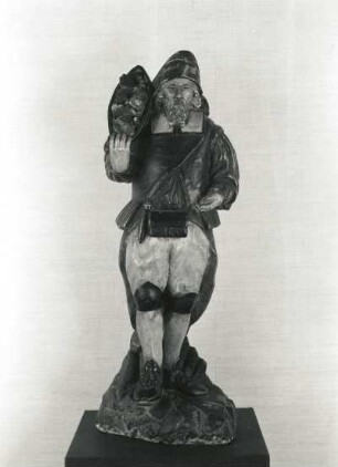 Bergmann mit Erztrog : Bergmann mit Erztrog, Steinplastik, bemalt ; Höhe 77 cm. Dresden : Ausstellung "Bergbau und Kunst in Sachsen", 1989, Kat. Nr. 277