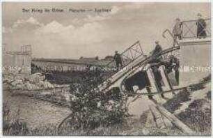 Zerstörte Eisenbahnbrücke bei Sypitken