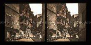Belebte Gasse, Rue Grenette, mit Marktständen und Fachwerkhaus, Thiers