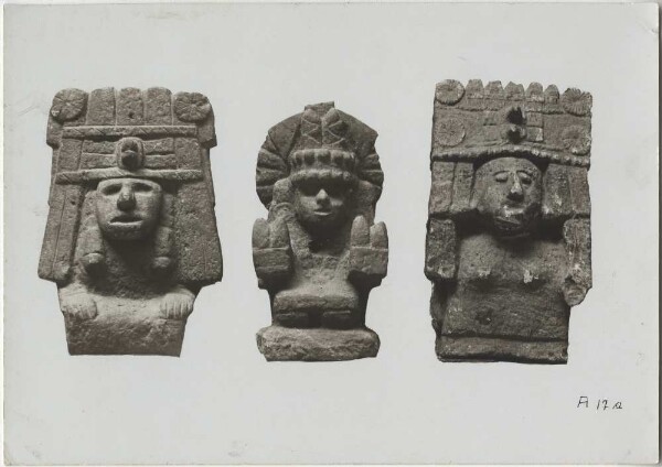 Three stone figures, the two outer ones: Chalchiuhtlicue, the centre one: the corn goddess Cinteotl. (front)