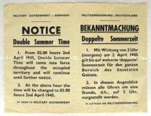 Maueranschlag der Militärregierung in Deutschland über die Einführung der Sommerzeit für das besetzte Gebiet (zweisprachig)