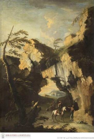 Felsformation mit Reiter und Ausblick auf Meeresküste