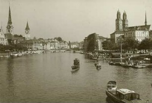 Zürich. Blick von der Quaibrücke flussabwärts. Im Hintergrund von links nach rechts: Fraumünsterkirche, Peterskirche, Münsterbrücke, Wasserkirche und Großmünster