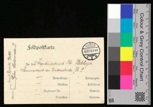 Auf der Postkarte ist ein Zeitungsausschnitt