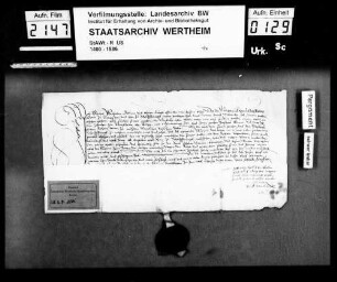 Michael Wilhelm bekennt, dass ihn Graf Wolfgang zu Löwenstein (Lewenstein), Herr zu Scharfenek, mit einem Teil des Zehnten zu Uelversheim (?, Ulveßheim) bei Alzey belehnt hat.