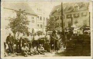 Gruppenbild von Arbeitern mit Lokomobile