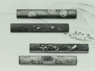 Vier Kozuka (Griffe für kleine Messer)