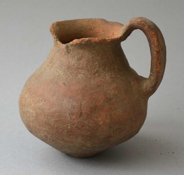 Clay jug with handle