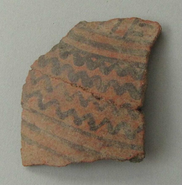 Clay shard of a vessel