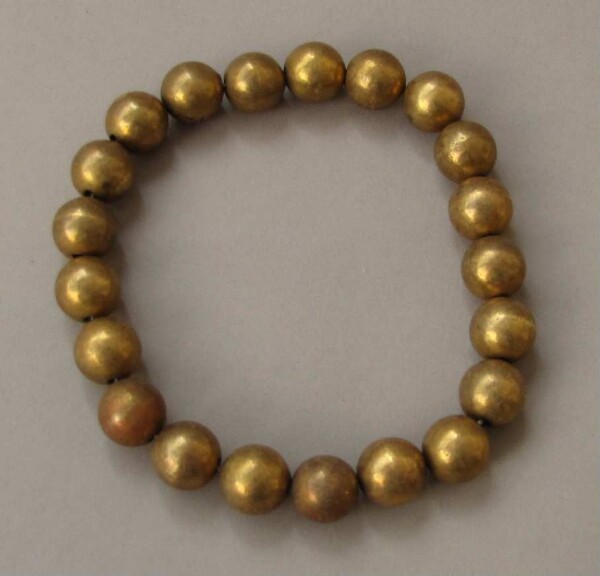 Necklace with gold beads