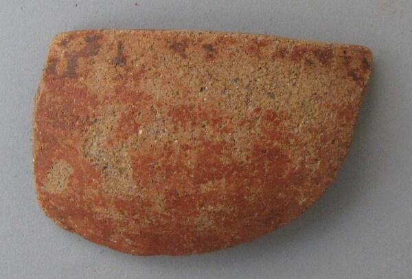 Rim sherd of a clay vessel