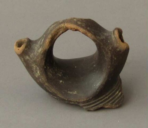 Fragment of a clay vessel