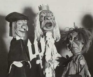 Drei Handpuppen: Wagner und zwei Meeresungeheuer
