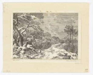 Holzhacken in winterlicher Landschaft
