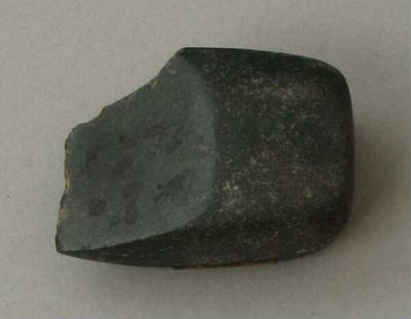 Stone axe blade (fragment)