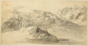See zwischen Felsen, vorn zwei Wanderer, rechts hinten Ruine