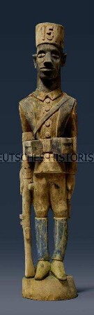 Colonfigur eines Afrikaner in Askari-Felduniform der Schutztruppe