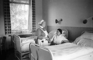 Freiburg: Schwester und Patientin