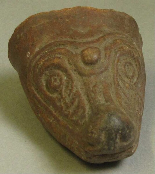 Clay animal head (vessel base)