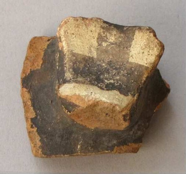 Fragment of a clay vessel