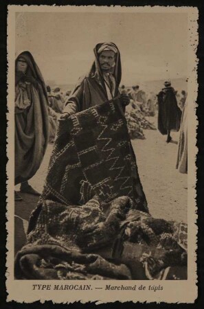 Ansichtskarte von Hofmannsthal an Gabriele Oppenheimer aus Marrakesch mit Ansicht eines marokkanischen Teppichhändlers