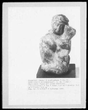 Phallische Figur mit einem Füllhorn