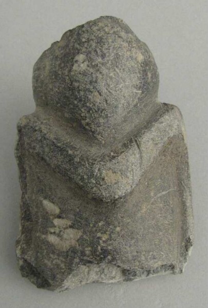 Torso of a stone figure