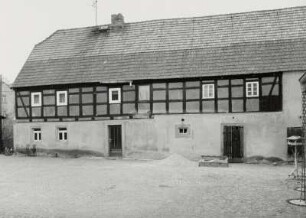 Medingen (Kreis Kamenz), ehemaliger Dreiseithof (18. Jahrhundert, um 1850), Dorfstraße 34/ Ecke Amseltal, Hofansicht des Seitengebäudes