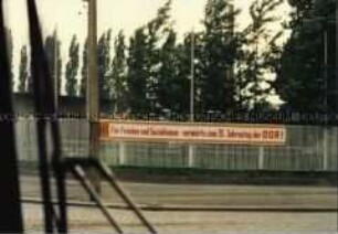 Slogan zum 35.Jahrestag der DDR