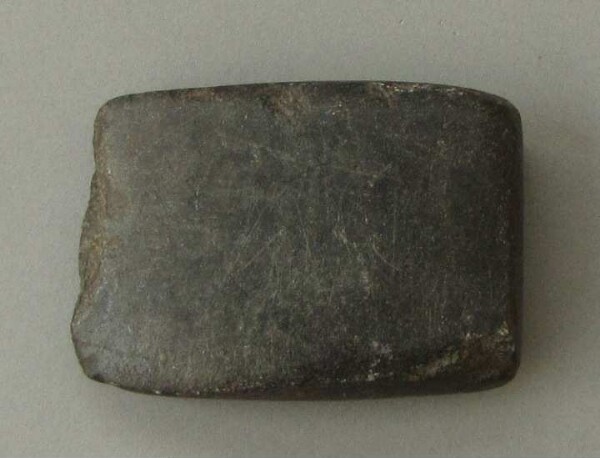 Stone axe blade (fragment)