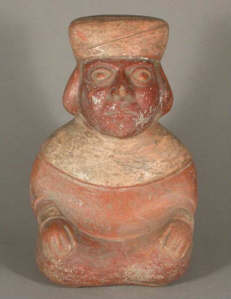 Seated anthropomorphic figure