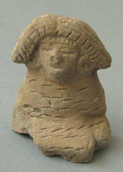 Figurine en argile (fragment)