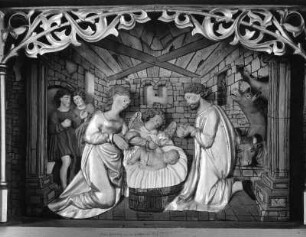 Altarretabel : Altarretabel. Holz, geschnitzt, gefaßt (um 1500; O. Haselwanter). Schreinrelief "Christi Geburt". Lavant, Filialkirche Sankt Petrus und Paulus, Linker Seitenaltar im Chor