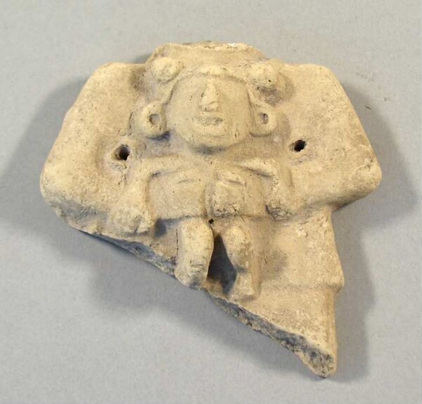 Figurine en argile (fragment de récipient)