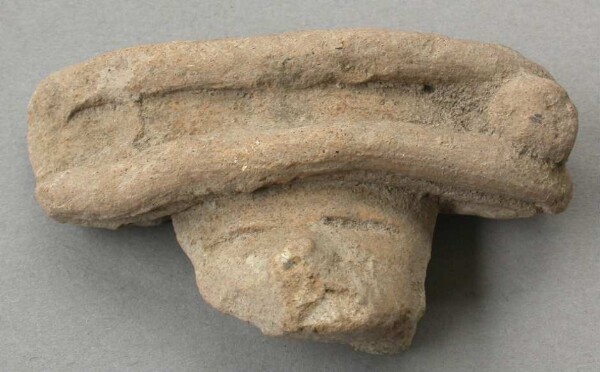 Tête d'argile (fragment)